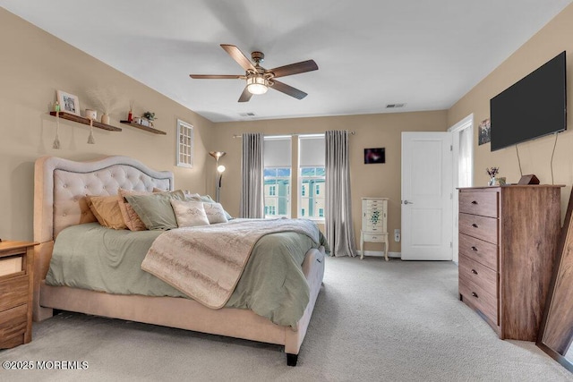 9 Olivia Dr, Tinton Falls, NJ 07712 - bedroom with light colored carpet and ceiling fan