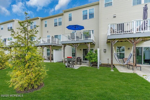 9 Olivia Dr, Tinton Falls, NJ 07712 - rear view of property with a patio area and a yard
