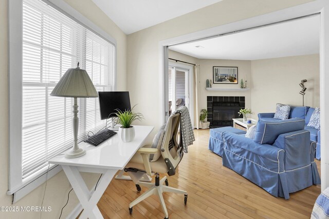 310 S W Ave Unit K1, Beach Haven, NJ 08008 - office area featuring a tiled fireplace and wood finished floors