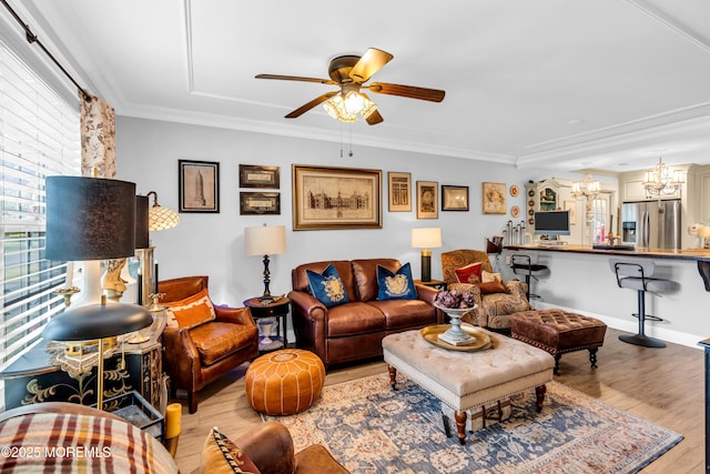75 Farnworth Close Unit 1000, Freehold, NJ 07728 - living area featuring light wood-style floors, a chandelier, ceiling fan, and ornamental molding