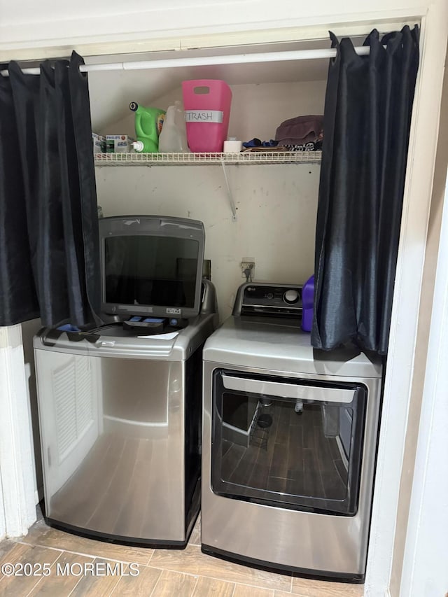 300 Allenhurst Ave, Neptune Township, NJ 07753 - laundry area with washing machine and clothes dryer and wood finished floors