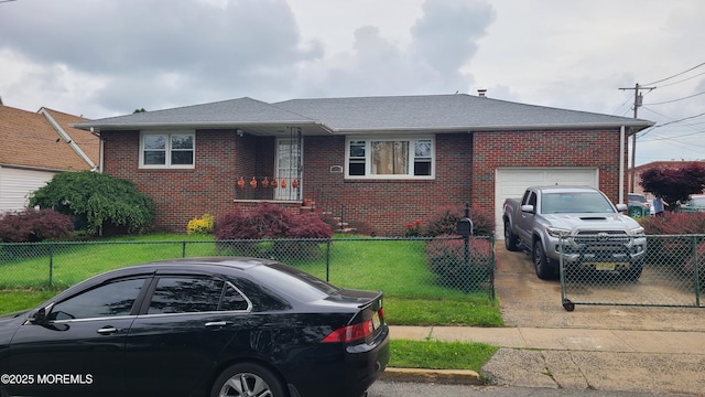 354 Alpine St, Perth Amboy City, NJ 08861 - view of front of home featuring a garage, brick siding, and a fenced front yard