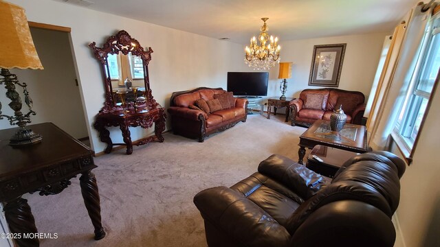354 Alpine St, Perth Amboy City, NJ 08861 - carpeted living room featuring a chandelier