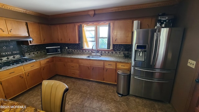 354 Alpine St, Perth Amboy City, NJ 08861 - kitchen with stainless steel appliances, extractor fan, backsplash, and brown cabinetry