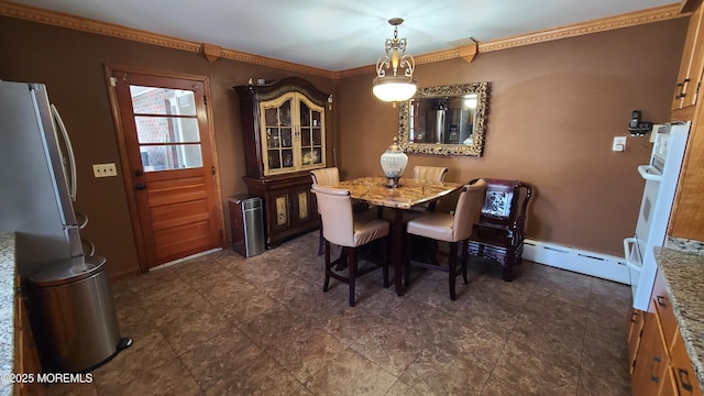 354 Alpine St, Perth Amboy City, NJ 08861 - dining room featuring crown molding and a baseboard radiator