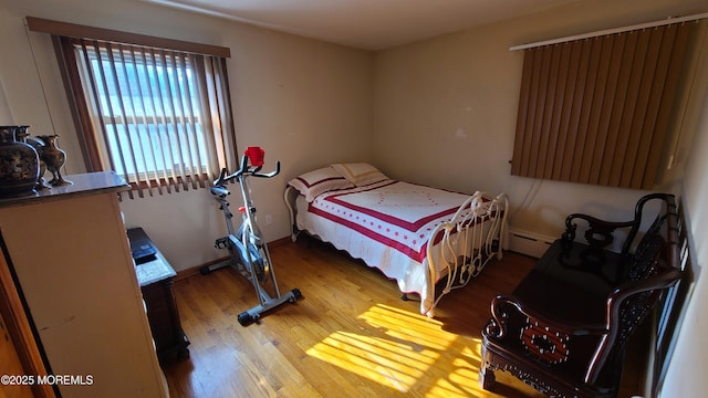 354 Alpine St, Perth Amboy City, NJ 08861 - bedroom featuring wood finished floors and baseboard heating