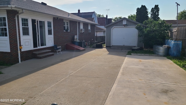 354 Alpine St, Perth Amboy City, NJ 08861 - view of home's exterior with entry steps, driveway, brick siding, and an outbuilding