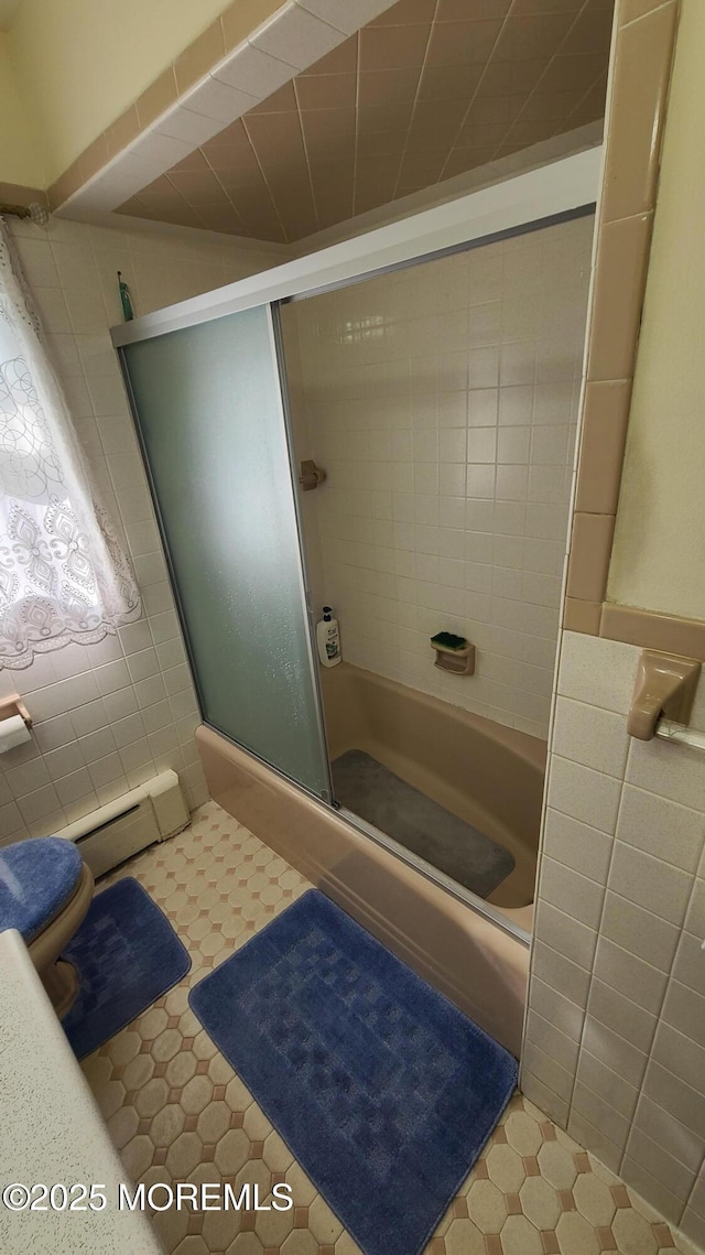 354 Alpine St, Perth Amboy City, NJ 08861 - full bath with tile walls, enclosed tub / shower combo, tile patterned floors, and baseboard heating