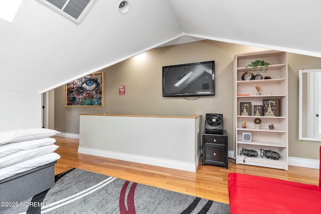 51 Oakland St, Red Bank, NJ 07701 - living room featuring lofted ceiling, wood finished floors, and baseboards
