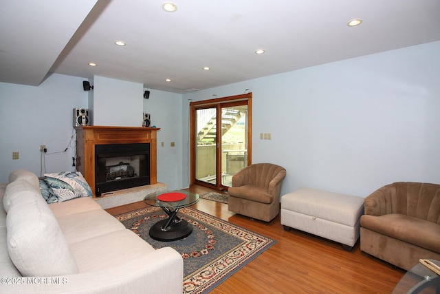 18 Kingsport Dr, Howell, NJ 07731 - living room featuring wood finished floors, recessed lighting, and a fireplace with raised hearth