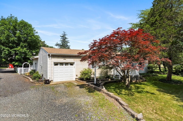 66 Cedar Swamp Rd, Jackson, NJ 08527 - view of property hidden behind natural elements with an attached garage and driveway