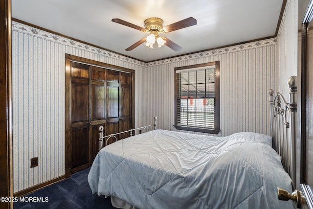 66 Cedar Swamp Rd, Jackson, NJ 08527 - bedroom with a closet, wallpapered walls, a ceiling fan, and dark colored carpet