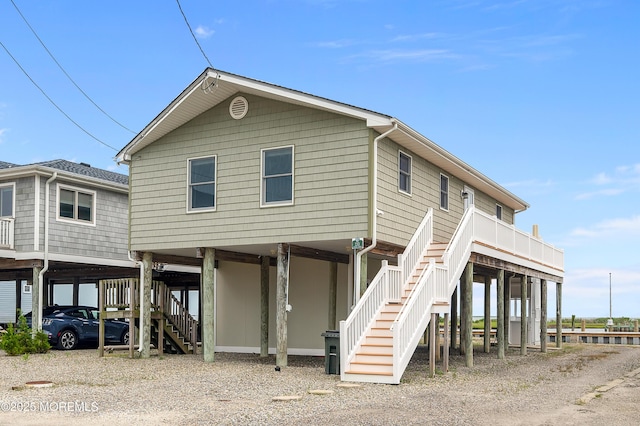 233 Heron Rd, Tuckerton, NJ 08087 - view of front of property featuring stairs, a carport, and driveway
