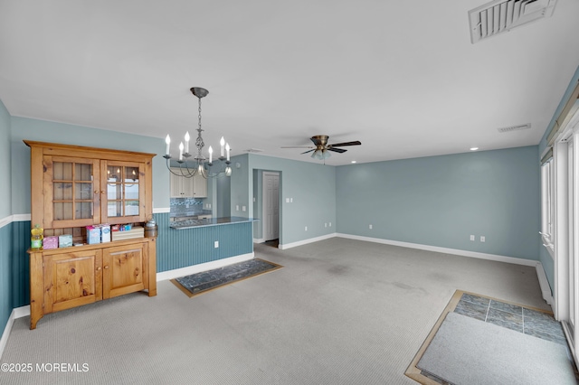233 Heron Rd, Tuckerton, NJ 08087 - unfurnished living room with ceiling fan, light colored carpet, a chandelier, baseboards, and recessed lighting