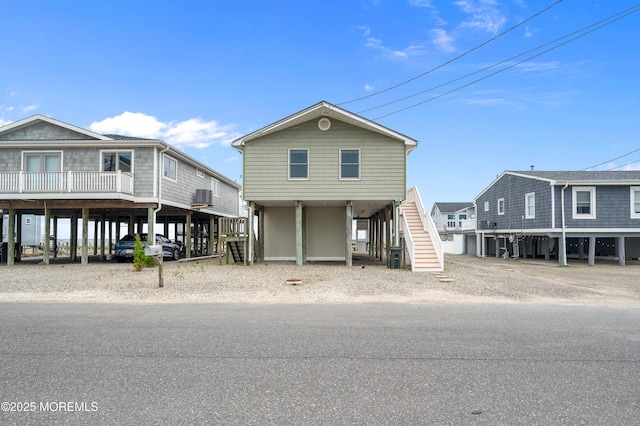 233 Heron Rd, Tuckerton, NJ 08087 - beach home featuring stairway, a carport, and driveway