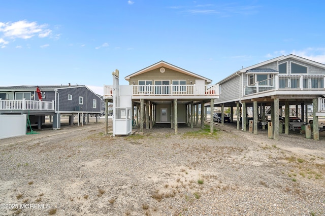 233 Heron Rd, Tuckerton, NJ 08087 - back of house featuring a carport and a deck