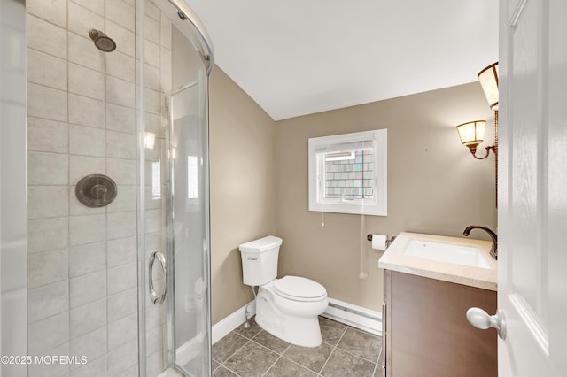 233 Heron Rd, Tuckerton, NJ 08087 - bathroom with a baseboard radiator, vanity, a shower stall, lofted ceiling, and toilet