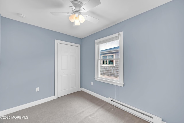 233 Heron Rd, Tuckerton, NJ 08087 - empty room with a baseboard radiator, baseboards, carpet floors, a ceiling fan, and a smoke detector