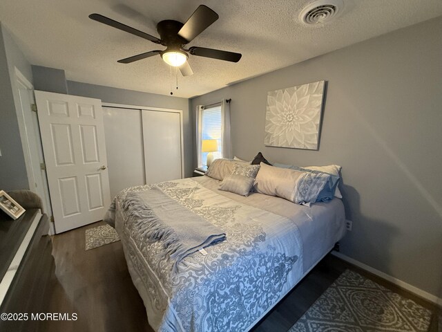 4 Hemlock Hill Rd, Jackson, NJ 08527 - bedroom with a closet, a textured ceiling, baseboards, wood finished floors, and a ceiling fan