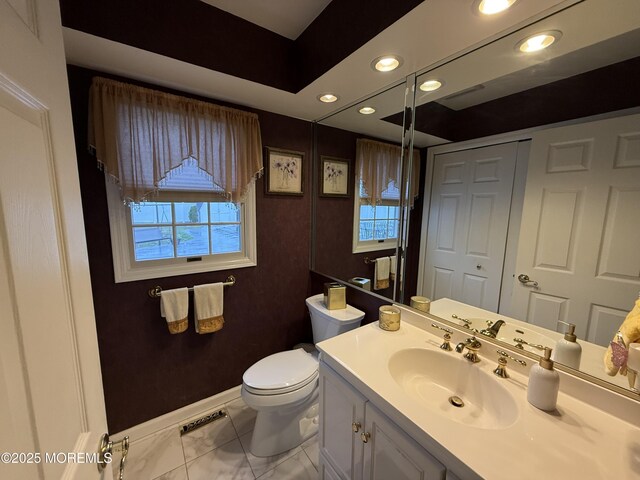 4 Hemlock Hill Rd, Jackson, NJ 08527 - bathroom with vanity, toilet, marble look tile flooring, baseboards, and recessed lighting