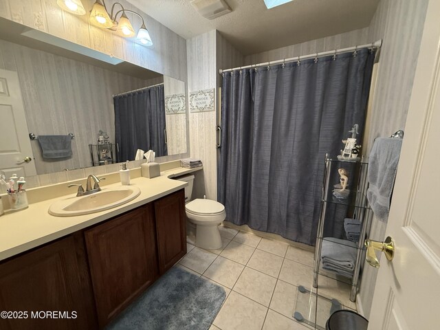 4 Hemlock Hill Rd, Jackson, NJ 08527 - full bath with wallpapered walls, vanity, toilet, tile patterned floors, and a textured ceiling
