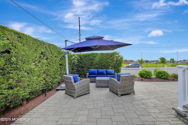 206 Chicago Ave, Point Pleasant Beach, NJ 08742 - fenced backyard with an outdoor hangout area and a patio