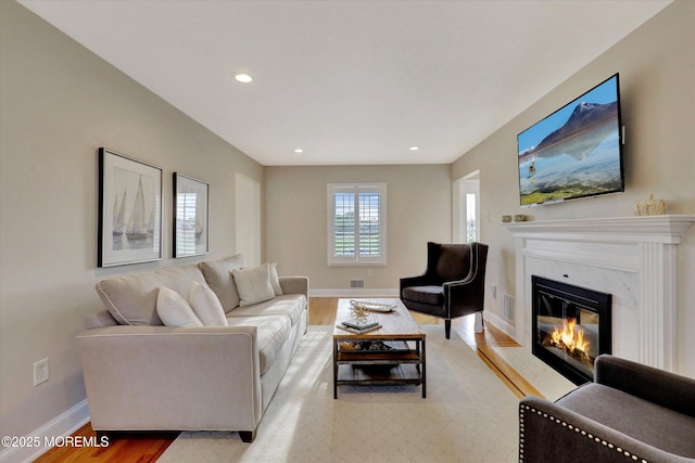 206 Chicago Ave, Point Pleasant Beach, NJ 08742 - living room featuring a fireplace, light wood finished floors, recessed lighting, and baseboards