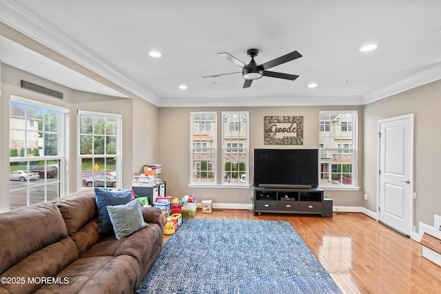 38 Phillip E Frank Way Unit 38, Cliffwood, NJ 07721 - living area with crown molding, healthy amount of natural light, ceiling fan, light wood-type flooring, and recessed lighting