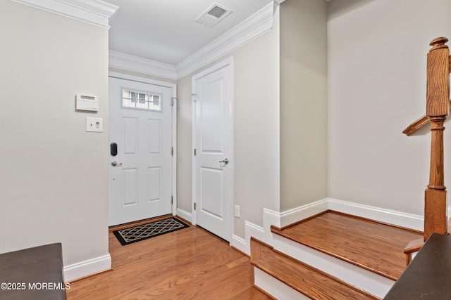 38 Phillip E Frank Way Unit 38, Cliffwood, NJ 07721 - entrance foyer featuring wood finished floors and ornamental molding