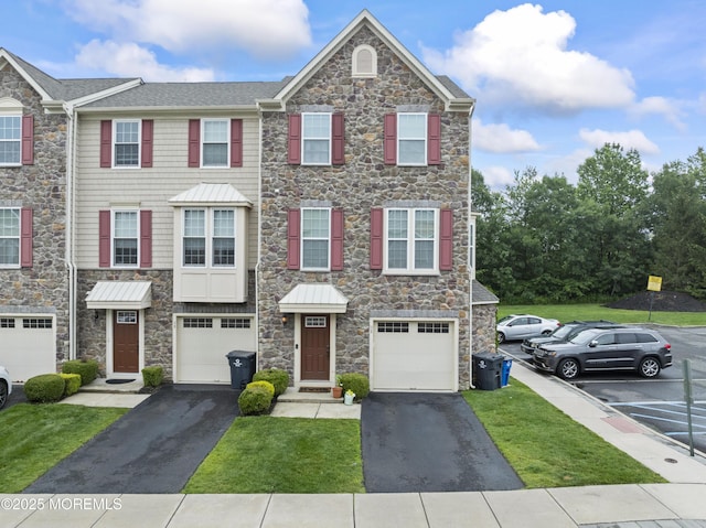 38 Phillip E Frank Way Unit 38, Cliffwood, NJ 07721 - view of property featuring stone siding, driveway, and an attached garage