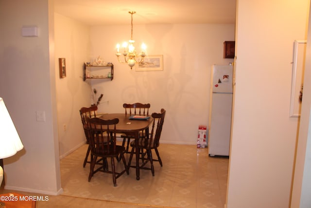 32C Yorktown Pkwy Unit C, Whiting, NJ 08759 - dining space featuring a chandelier and light floors