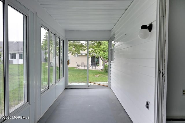 22 Elmswell Ave, Manchester, NJ 08759 - unfurnished sunroom featuring healthy amount of natural light and finished concrete floors