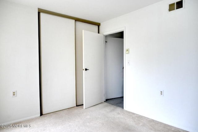 22 Elmswell Ave, Manchester, NJ 08759 - unfurnished bedroom with light colored carpet and a closet