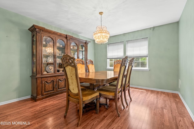 74 Mc Kinley Dr, Ocean Twp, NJ 07712 - dining room with a chandelier and wood finished floors