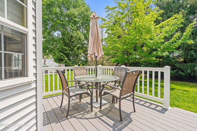 74 Mc Kinley Dr, Ocean Twp, NJ 07712 - deck with outdoor dining space, a yard, and view of scattered trees