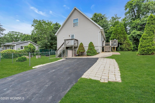 532 Georgia Tavern Rd, Howell, NJ 07731 - view of front of property with stairway, a wooden deck, and asphalt driveway