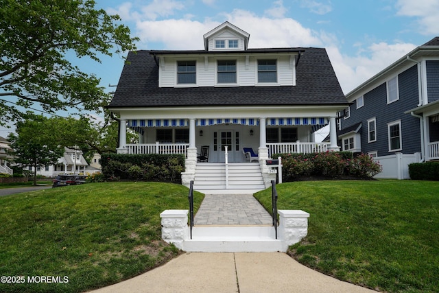 342 Lincoln Ave, Avon-By-The-Sea, NJ 07717 - view of front of house featuring covered porch, a front lawn, roof with shingles, and french doors