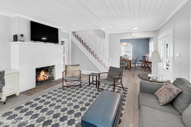 342 Lincoln Ave, Avon-By-The-Sea, NJ 07717 - living room featuring crown molding, wood finished floors, stairway, wooden ceiling, and a fireplace