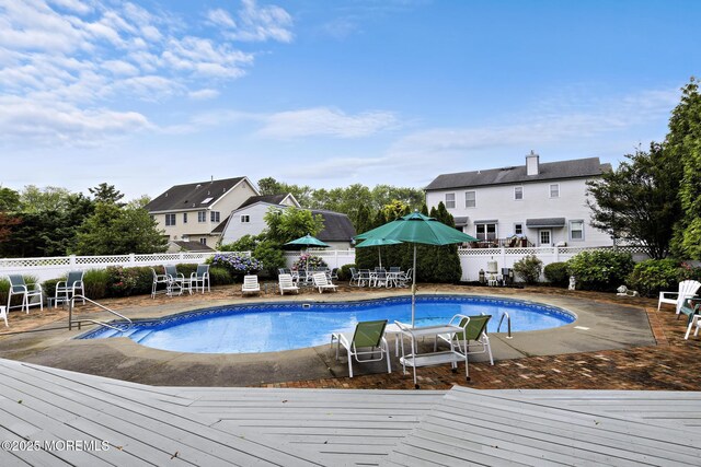 14 W St, Monmouth Beach, NJ 07750 - view of pool with a fenced backyard and a deck