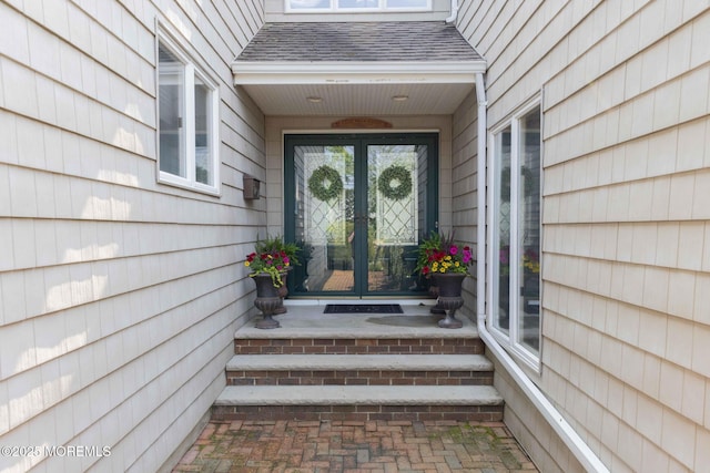 14 W St, Monmouth Beach, NJ 07750 - doorway to property featuring french doors and roof with shingles