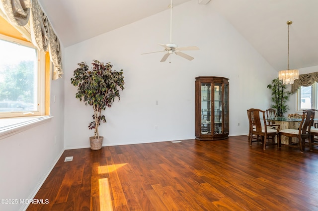 892 Eaglehurst Rd, Toms River, NJ 08753 - dining area featuring a chandelier, a ceiling fan, wood finished floors, and high vaulted ceiling