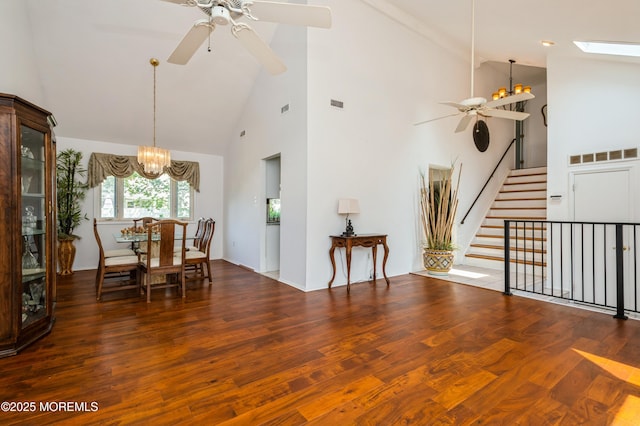 892 Eaglehurst Rd, Toms River, NJ 08753 - dining room featuring ceiling fan, high vaulted ceiling, a chandelier, wood finished floors, and stairway