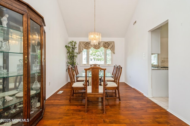 892 Eaglehurst Rd, Toms River, NJ 08753 - dining space featuring a chandelier, wood finished floors, and high vaulted ceiling
