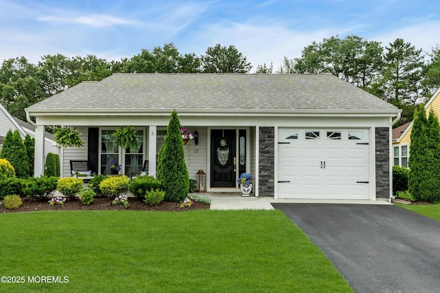 37 Normanton Ave, Manchester, NJ 08759 - ranch-style house featuring driveway, a garage, a front yard, covered porch, and stone siding