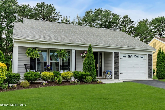 37 Normanton Ave, Manchester, NJ 08759 - view of front of house with a front yard, a garage, driveway, stone siding, and roof with shingles