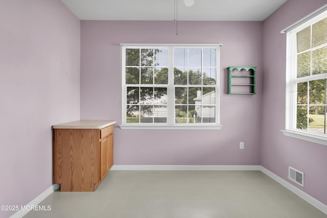 48 Wordsworth Rd, Brick, NJ 08724 - unfurnished dining area with baseboards and ceiling fan