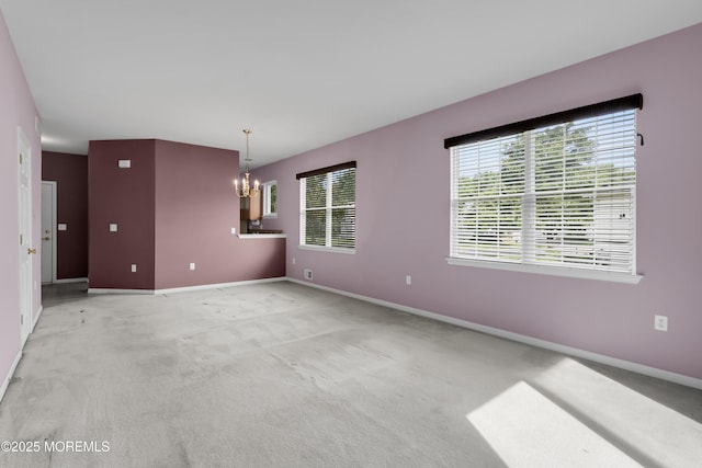 48 Wordsworth Rd, Brick, NJ 08724 - empty room featuring a chandelier and light colored carpet