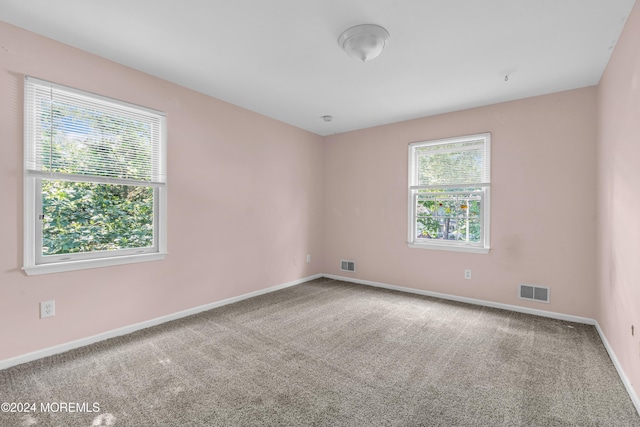 4 W Dickens Ct, Jackson, NJ 08527 - carpeted spare room with baseboards