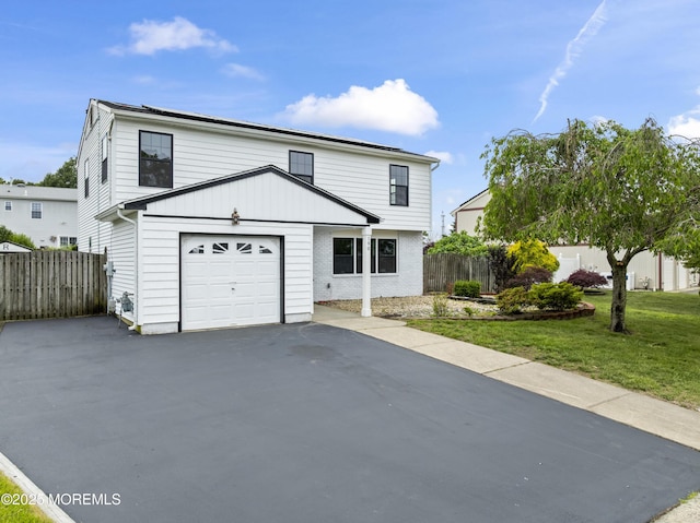 190 Ravenwood Blvd, Barnegat, NJ 08005 - traditional-style house with asphalt driveway