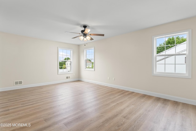 190 Ravenwood Blvd, Barnegat, NJ 08005 - empty room featuring healthy amount of natural light, ceiling fan, light wood finished floors, and baseboards